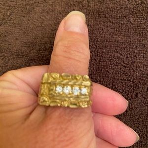 Men’s gold nugget ring.